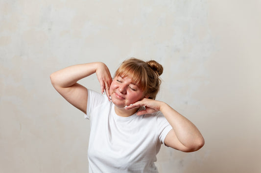 a person with the hands on the face