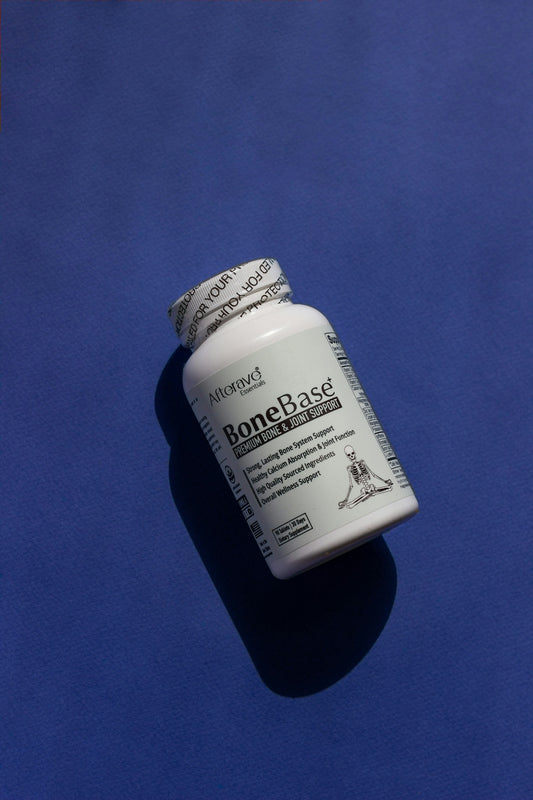 A close up of a pill bottle on a blue surface